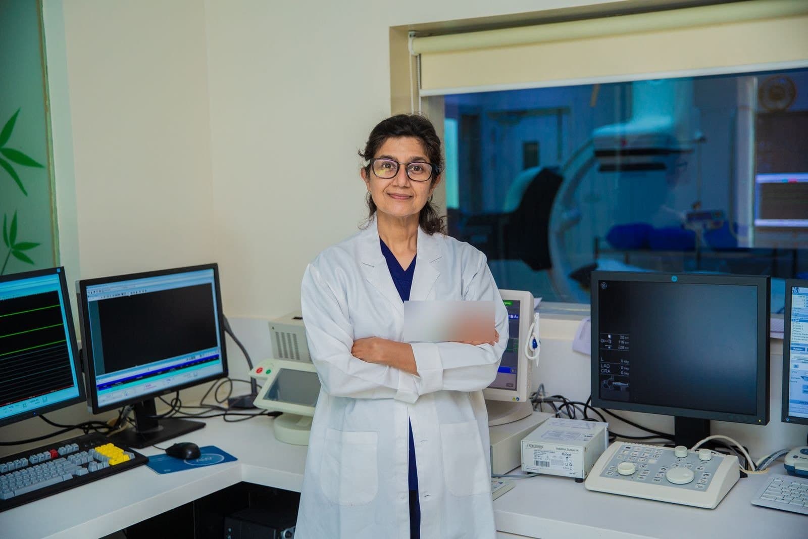 A physician in a modern diagnostic imaging suite in India