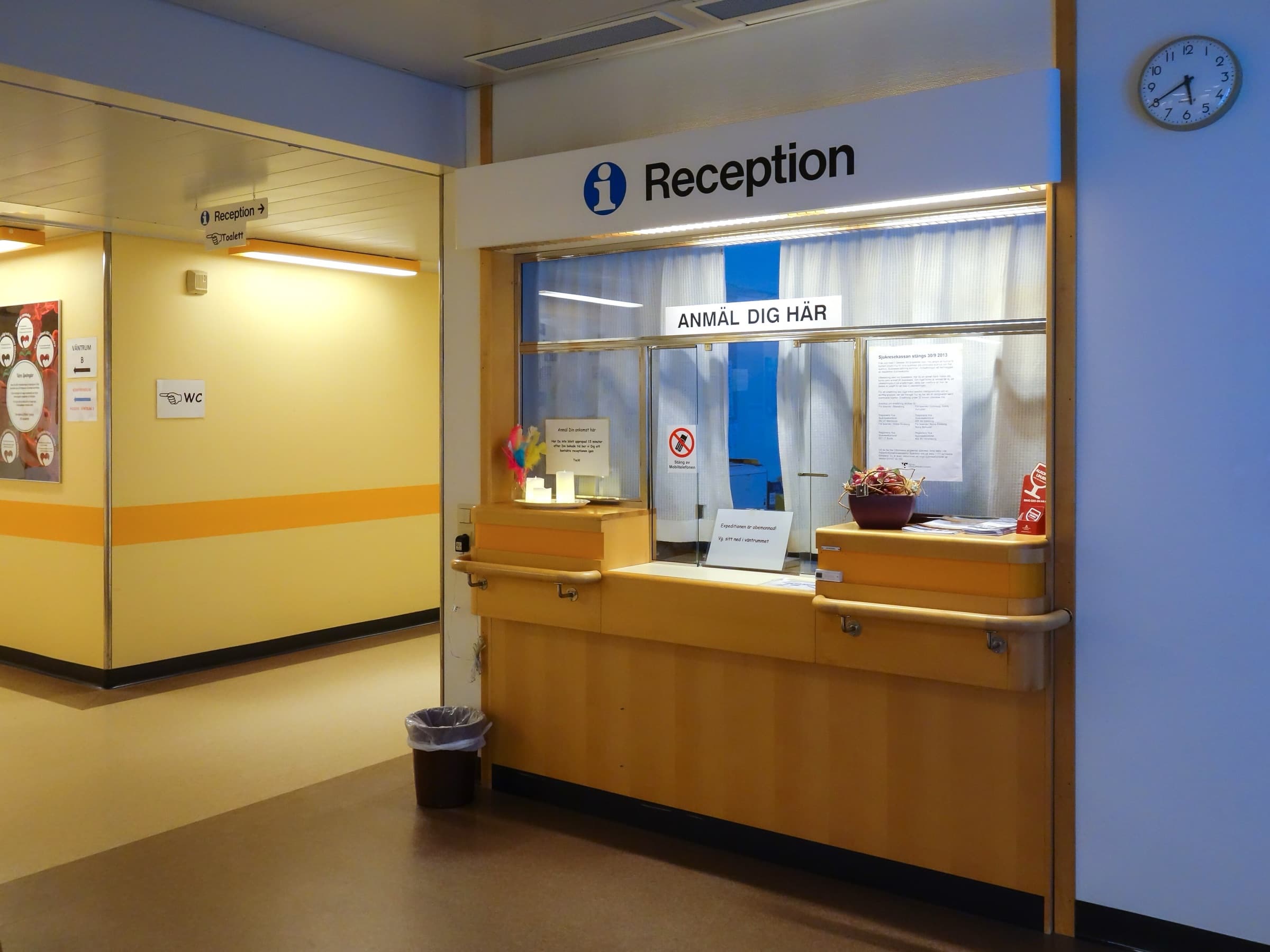 Clean, modern clinical reception desk in natural light