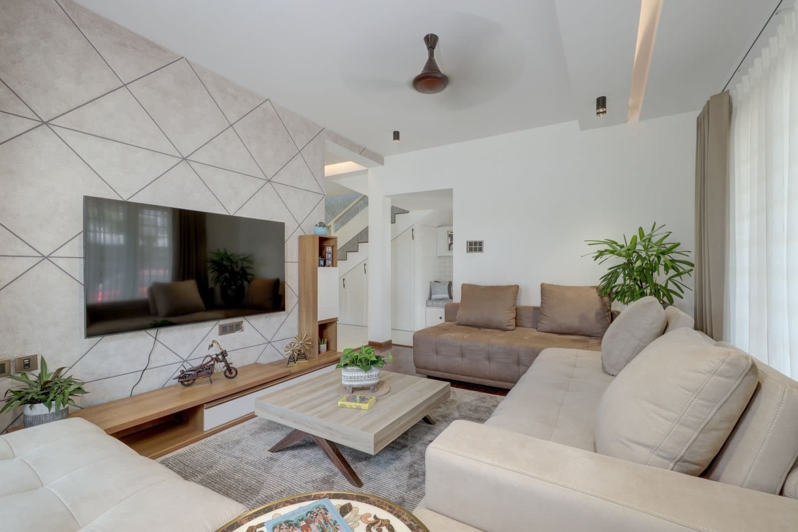 A premium modern living room interior in an Indian home